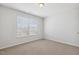 Bright bedroom with a large window providing ample natural light at 232 Big Barn Dr, Wendell, NC 27591