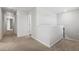Bright hallway with carpet flooring and white walls at 232 Big Barn Dr, Wendell, NC 27591