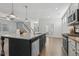 Open-concept kitchen with island offers seating and an open floor plan at 232 Big Barn Dr, Wendell, NC 27591