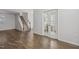 Spacious living room with hardwood floors and bright, french doors at 232 Big Barn Dr, Wendell, NC 27591