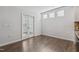 Living room with hardwood floors and bright, french doors at 232 Big Barn Dr, Wendell, NC 27591
