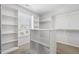 Spacious walk-in closet with an abundance of shelves and storage at 232 Big Barn Dr, Wendell, NC 27591