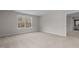 Spacious bedroom featuring a large window that offers a great view of the trees outdoors at 9184 Phoenix Ct, Middlesex, NC 27557