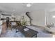 Bright living room features an open floor plan and blends seamlessly into the dining and kitchen areas at 9184 Phoenix Ct, Middlesex, NC 27557