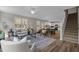 Open concept living area seamlessly flows into the dining room and modern kitchen, perfect for entertaining at 9184 Phoenix Ct, Middlesex, NC 27557