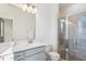 Bathroom featuring a glass shower with marble backsplash at 853 Parc Townes Dr # 9, Wendell, NC 27591