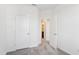 Carpeted bedroom featuring two doors to a bathroom and closet at 853 Parc Townes Dr # 9, Wendell, NC 27591