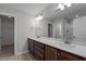 Bathroom featuring double sink vanity with shaker cabinets and white quartz countertop at 9154 Phoenix Ct, Middlesex, NC 27557