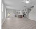 Open concept kitchen and living room with luxury vinyl plank flooring at 9154 Phoenix Ct, Middlesex, NC 27557