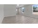 Spacious living room featuring luxury vinyl plank flooring and plenty of natural light at 9154 Phoenix Ct, Middlesex, NC 27557