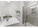 Bathroom featuring glass shower and modern fixtures at 10529 Pleasant Branch Dr # 201, Raleigh, NC 27614