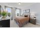 Bedroom with lots of light, decor, and neutral colored carpet at 10529 Pleasant Branch Dr # 201, Raleigh, NC 27614