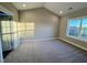 Bright bedroom with neutral carpet, large window and plenty of natural light at 1064 Fairhaven Dr # 95, Mebane, NC 27302