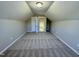 Finished third floor bonus room featuring carpet and neutral paint at 1064 Fairhaven Dr # 95, Mebane, NC 27302