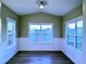 Dining area with wainscoting, large bright windows, and ample sunlight at 1064 Fairhaven Dr # 95, Mebane, NC 27302