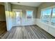 Bright dining area with wainscoting and sliding glass door to the outside at 1064 Fairhaven Dr # 95, Mebane, NC 27302