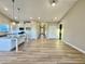 Spacious open-concept living area with modern wood floors, connecting the kitchen and other living spaces at 1064 Fairhaven Dr # 95, Mebane, NC 27302