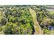 An aerial view showcases the property's proximity to a lush green golf course at 132 Prairie Dog Dr, Louisburg, NC 27549