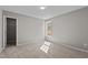 Bedroom with a window providing natural light, carpet flooring, and ample space at 132 Prairie Dog Dr, Louisburg, NC 27549