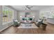 Inviting living room with neutral tones, stylish decor, and a view of the outdoors at 132 Prairie Dog Dr, Louisburg, NC 27549