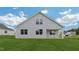 Backyard of a home with a grassy lawn at 1688 Abberly Pl, Graham, NC 27253
