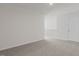 Neutral bedroom featuring carpeted floors and a closet at 1688 Abberly Pl, Graham, NC 27253