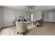 Cozy living room with modern furniture, light wood floors, and a calm, inviting atmosphere at 200 Rawhide Dr, Louisburg, NC 27549