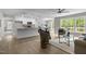 Stylish living area with an open floor plan, neutral tones, and plenty of natural light at 200 Rawhide Dr, Louisburg, NC 27549
