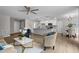 Airy, open concept living room and kitchen area with stylish furnishings and a relaxed ambiance at 200 Rawhide Dr, Louisburg, NC 27549