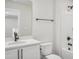 Clean bathroom featuring a vanity with a quartz countertop and a shower/tub combination at 909 Montague Ave, Durham, NC 27703