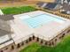 Community pool aerial view features lap lanes, a zero entry, and a clubhouse at 105 Wilderness Ct, Mebane, NC 27302