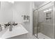 Modern bathroom featuring a glass-enclosed shower, sleek vanity, and neutral color scheme at 10535 Pleasant Branch Dr # 201, Raleigh, NC 27614