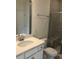 Modern bathroom featuring a spacious vanity and large glass shower with a convenient shower bench at 1600 Maelyn Way, Fuquay Varina, NC 27526