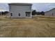 Home showcasing a spacious backyard ready for landscaping or outdoor activities at 178 Vili Dr, Broadway, NC 27505