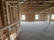 Spacious new home bedroom with wood framing and window at 178 Vili Dr, Broadway, NC 27505