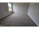 Bedroom with neutral carpet and walls and one window at 178 Vili Dr, Broadway, NC 27505