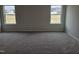 Spacious bedroom with neutral carpeting and large windows at 178 Vili Dr, Broadway, NC 27505