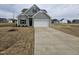 Charming new construction home with two-car garage and long driveway on a large lot at 178 Vili Dr, Broadway, NC 27505