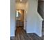 Hallway view shows the stairs, guest bath, and closet at 178 Vili Dr, Broadway, NC 27505