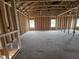 Spacious interior under construction with wood framing, electrical wiring, and OSB flooring at 178 Vili Dr, Broadway, NC 27505