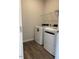 Laundry room with washer, dryer, and wire shelf at 178 Vili Dr, Broadway, NC 27505