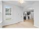 Bright dining area featuring a window, door, and views of the open kitchen at 2750 Lacy Holt Rd, Graham, NC 27253