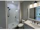 Modern bathroom with marble vanity, glass shower, and black hexagon tile at 314 Hinton St, Apex, NC 27502