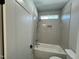 Clean bathroom, featuring a bathtub and shower combination at 314 Hinton St, Apex, NC 27502