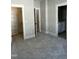 Well-lit bedroom with carpet, walk-in closet, and attached bath at 314 Hinton St, Apex, NC 27502
