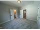 Bright bedroom with carpet and access to hallway and bathroom at 314 Hinton St, Apex, NC 27502