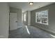 Spacious bedroom with carpet flooring and large windows at 314 Hinton St, Apex, NC 27502