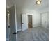 Spacious bedroom with carpet and access to hallway at 314 Hinton St, Apex, NC 27502
