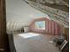 Unfinished bonus room with window, ready for customization at 314 Hinton St, Apex, NC 27502