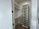 Functional closet with shelves and hanging space at 314 Hinton St, Apex, NC 27502